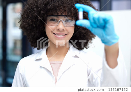 Science, vial and portrait of a female scientist working on research for a project in a lab. Medical innovation, pharmaceutical and woman biology researcher with glasses for discovery in a laboratory 135167152