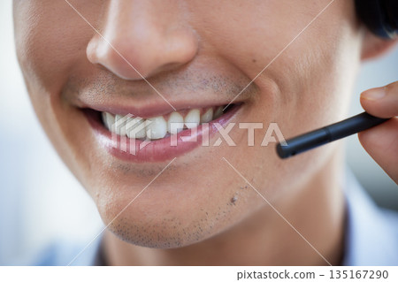 Microphone, mouth and call center agent man talking for customer care service, crm or telemarketing. Smile closeup of consultant person with headset for sales, contact us or help desk support 135167290