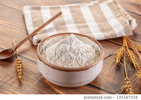White flour powder in the bowl White flour powder in the bowl 135167338