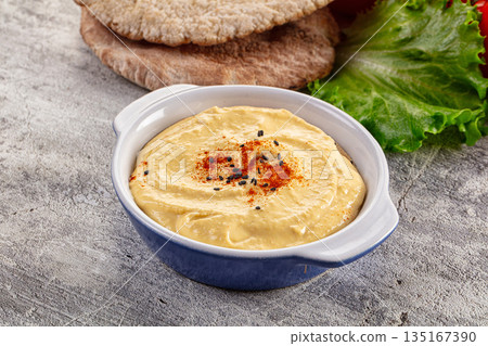 Arabic chickpea hummus with pita 135167390