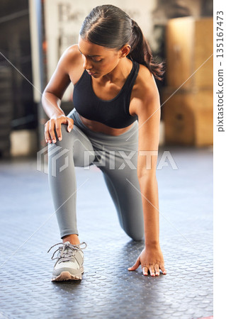 Gym, lunges or woman stretching in training, exercise or body workout for balance or strong muscles. Warm up, resilience or healthy Indian girl athlete exercising for powerful legs in fitness club Gym, lunges or woman stretching in training, exercise or body workout for balance or strong muscles. Warm up, resilience or healthy Indian girl athlete exercising for powerful legs in fitness club 135167473