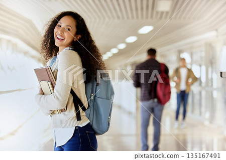 University student, books and portrait of a woman in school for education, learning and studying. Happy african person with a backpack at college or campus for knowledge and future with scholarship University student, books and portrait of a woman in school for education, learning and studying. Happy african person with a backpack at college or campus for knowledge and future with scholarship 135167491