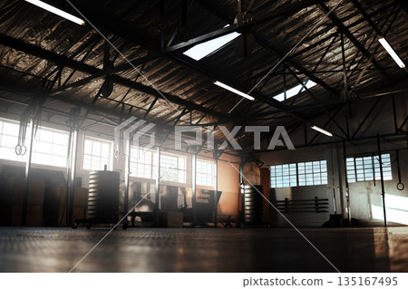 Empty gym, fitness or floor space for training hall in open room or health studio for exercise or workout. Interior, background or clean facility building for athletic sports or athletics development Empty gym, fitness or floor space for training hall in open room or health studio for exercise or workout. Interior, background or clean facility building for athletic sports or athletics development 135167495