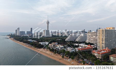 Pattaya beach and cityscape dominating the coastline at sunset 135167631