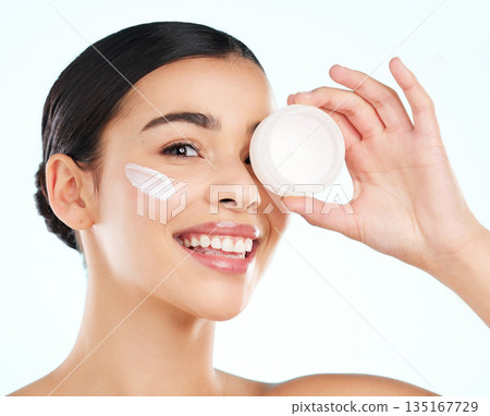 Face, skincare and woman with cream container in studio isolated on a white background. Portrait, dermatology product and happy female model with beauty cosmetics, creme or lotion for healthy skin. Face, skincare and woman with cream container in studio isolated on a white background. Portrait, dermatology product and happy female model with beauty cosmetics, creme or lotion for healthy skin. 135167729