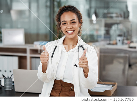 Doctor, woman and thumbs up portrait with healthcare and hospital success at clinic. Thank you, medical and professional with a smile from agreement, emoji and yes motivation hand sign from wellness 135167796