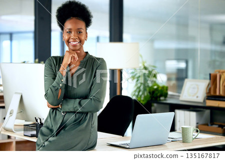 Portrait of confident black woman in modern office with smile, computer and African entrepreneur with pride. Happy face of businesswoman at small business startup and female boss at management agency 135167817