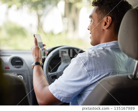 Delivery man sitting in car with phone, smile and checking location, order or online map for logistics. Courier service, happy driver in van and internet connection on cellphone for logistic schedule 135167989