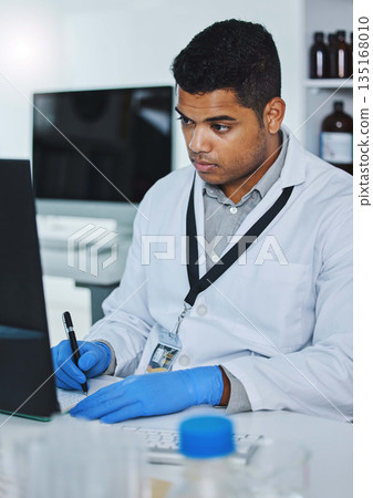 Scientist man, writing and lab computer for medical notes, pharmaceutical report and research with data analysis. Young science expert, pc and paperwork for test, check and innovation in laboratory Scientist man, writing and lab computer for medical notes, pharmaceutical report and research with data analysis. Young science expert, pc and paperwork for test, check and innovation in laboratory 135168010