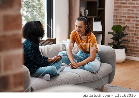 Relax, conversation and mother with daughter on sofa in living room for communication, empathy and support. Gossip, helping and discussion with woman and girl in family home for trust and bonding Relax, conversation and mother with daughter on sofa in living room for communication, empathy and support. Gossip, helping and discussion with woman and girl in family home for trust and bonding 135168030