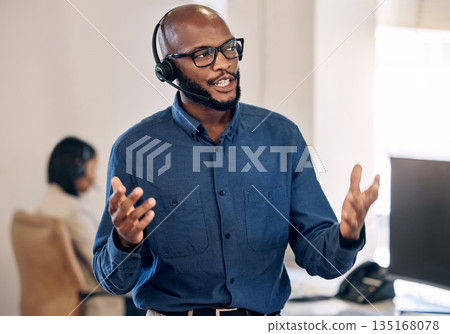 Call center, talking and black man with headset for customer service, crm or telemarketing support. African person, consultant or agent talk on microphone for sales, contact us or help desk advice Call center, talking and black man with headset for customer service, crm or telemarketing support. African person, consultant or agent talk on microphone for sales, contact us or help desk advice 135168078