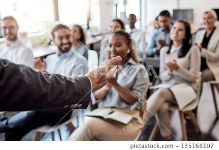Speaker, business training or talking with hand in presentation, seminar or speaking to professional conference meeting. People, audience or group of workers at corporate tradeshow or workshop Speaker, business training or talking with hand in presentation, seminar or speaking to professional conference meeting. People, audience or group of workers at corporate tradeshow or workshop 135168107