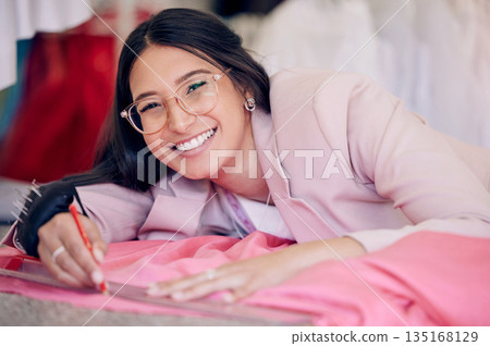 Fashion design, production and portrait of woman in retail, pattern and textile, manufacturing or tailor industry. Lines, creative and face of happy person or designer for clothes, fabric and startup Fashion design, production and portrait of woman in retail, pattern and textile, manufacturing or tailor industry. Lines, creative and face of happy person or designer for clothes, fabric and startup 135168129