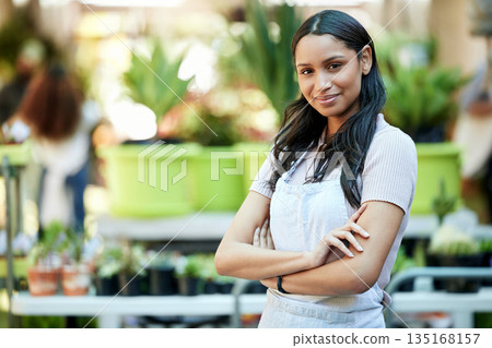 Happy, pride and portrait of a woman in a garden or nursery as a business owner or employee. Smile, plant expert and a worker at an ecology shop in a park with mockup space for retail or service Happy, pride and portrait of a woman in a garden or nursery as a business owner or employee. Smile, plant expert and a worker at an ecology shop in a park with mockup space for retail or service 135168157