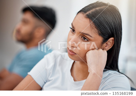 Couple, fight and sad woman with stress and depressed on living room sofa with relationship problem. Divorce talk, cheating anxiety and marriage crisis of people on a lounge couch at home thinking 135168199
