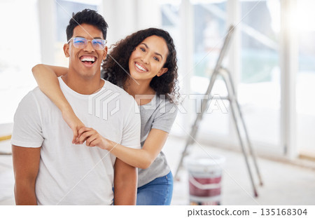Portrait, renovation and diy with a couple in their new home together for a remodeling project. Construction, real estate or property improvement with a man and woman bonding over house maintenance 135168304
