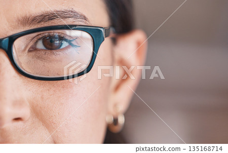 Business woman, face and glasses closeup of a professional with vision and eyes. Workforce, young worker eye and female person in a office with a staff portrait, lens and frame with mockup at job 135168714