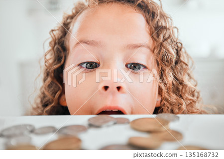 Finance, surprise and coins with child at home for savings, money and budget. Growth, learning and cash with face of shocked girl and change on table for investment, profit or banking responsibility 135168732