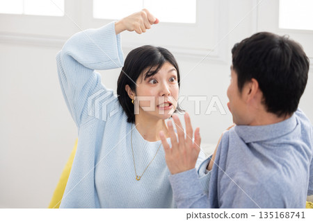 A wife attacks her husband and the husband is frightened A wife attacks her husband and the husband is frightened 135168741
