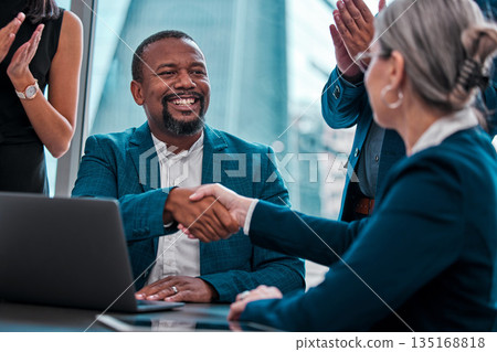 Hiring success, meeting and business people with a handshake with applause at work. Happy, support and a black man shaking hands with a manager with workers clapping for partnership and welcome 135168818