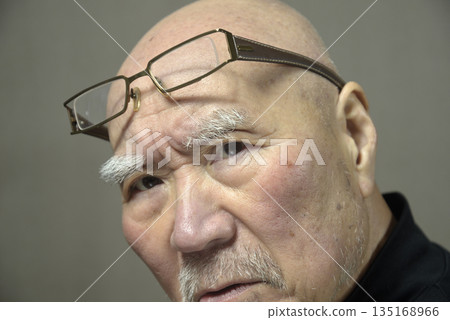Close-up of an elderly man's troubled face Close-up of an elderly man's troubled face 135168966