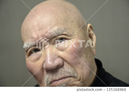 Close-up of an elderly man's troubled face Close-up of an elderly man's troubled face 135168968