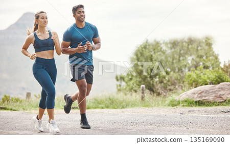 Running, mountain road and couple of friends training for sports and health outdoor. Fitness, workout and sport run of young runner people together on a street with athlete exercise and race cardio 135169090