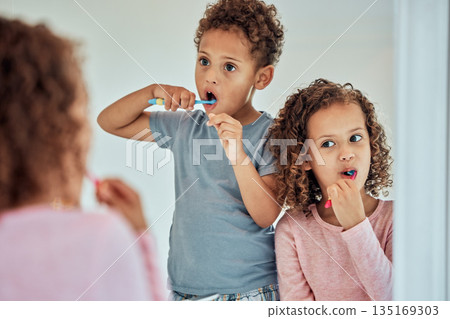 Brushing teeth, mirror and dental with children in bathroom for morning, smile and cleaning. Oral hygiene, health and toothbrush with brother and sister in family home for wake up, mouth and results 135169303