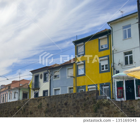 Building with colourful facades in european town. Historic architecture with old traditional houses, Building with colourful facades in european town. Historic architecture with old traditional houses, 135169345
