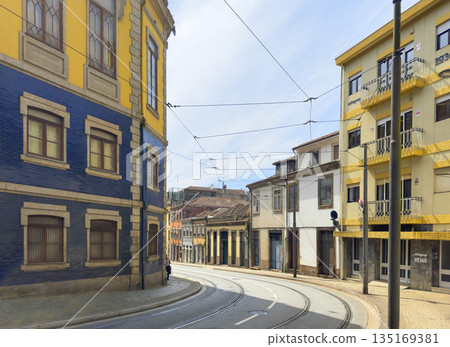 Oporto building facades in historic city street. Traditional colourful houses with tile decoration, 135169381