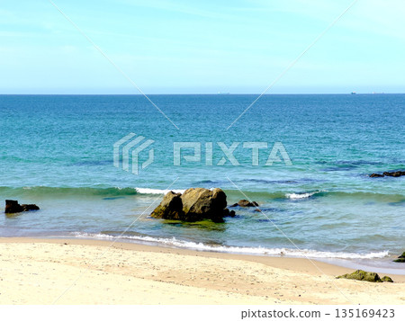Water in ocean seascape. Blue sea with calm clear surface under sunny sky, tropical summer horizon 135169423