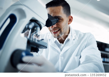 Science, research and man with microscope in laboratory for medical analysis, innovation and dna test. Healthcare, biotechnology and male scientist with equipment for study, virus sample and medicine 135169432