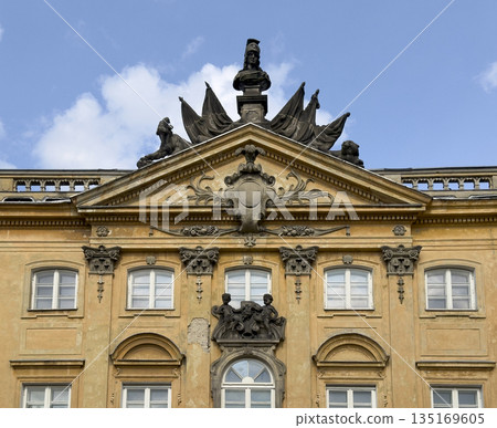 The Sapieha Palace, Palac Sapiehow in Warsaw, Poland, with its richly decorated Baroque facade and The Sapieha Palace, Palac Sapiehow in Warsaw, Poland, with its richly decorated Baroque facade and 135169605
