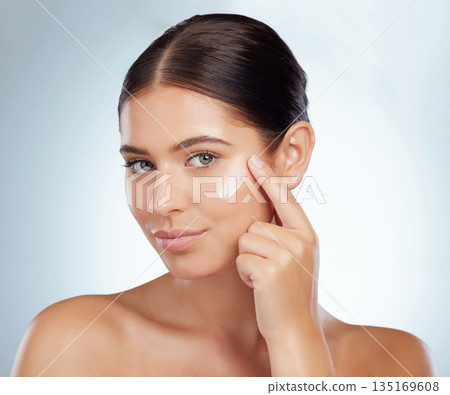 Face, skincare and beauty of woman with cream in studio isolated on a white background. Portrait, dermatology lotion and female model apply cosmetics, sunscreen or moisturizer product for skin health Face, skincare and beauty of woman with cream in studio isolated on a white background. Portrait, dermatology lotion and female model apply cosmetics, sunscreen or moisturizer product for skin health 135169608