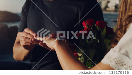 Love, proposal and engagement with hands of couple in outdoor for marriage, commitment or trust. Wedding ring, roses and jewelry with closeup of man and woman for announcement, celebration and fiance Love, proposal and engagement with hands of couple in outdoor for marriage, commitment or trust. Wedding ring, roses and jewelry with closeup of man and woman for announcement, celebration and fiance 135170516