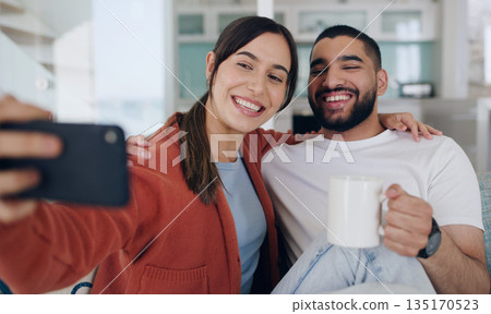 Home, selfie and couple smile on sofa for social media post, online vlog and internet with coffee. Dating, morning and happy man and woman take picture for update, bonding and relax in living room Home, selfie and couple smile on sofa for social media post, online vlog and internet with coffee. Dating, morning and happy man and woman take picture for update, bonding and relax in living room 135170523