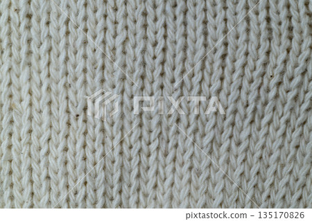 Close-up of the knit texture of white cotton work gloves Close-up of the knit texture of white cotton work gloves 135170826