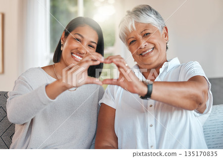 Heart hands, portrait and elderly mother and daughter with care, affection or empathy. Love, hand gesture or senior mom with woman for support on mothersday, trust or kindness, family smile and emoji Heart hands, portrait and elderly mother and daughter with care, affection or empathy. Love, hand gesture or senior mom with woman for support on mothersday, trust or kindness, family smile and emoji 135170835