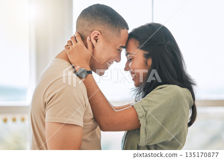 Couple, love and forehead touch in home for happiness, intimacy and relax for romance, bonding and trust together. Happy man, woman and hug partner for quality time, care and smile for commitment Couple, love and forehead touch in home for happiness, intimacy and relax for romance, bonding and trust together. Happy man, woman and hug partner for quality time, care and smile for commitment 135170877