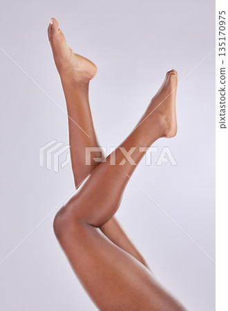 Beauty, wellness and legs of woman on studio floor for shaving, grooming and hair removal. Skincare, underwear and female person on white background for epilation cosmetics, natural skin or body care 135170975