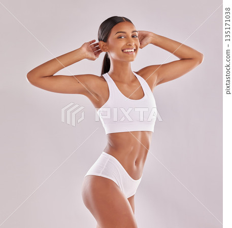 Woman in underwear, smile in portrait with body and fitness, health and skin isolated on studio background. Happy female model, abdomen and healthy lifestyle with wellness and person lose weight 135171038