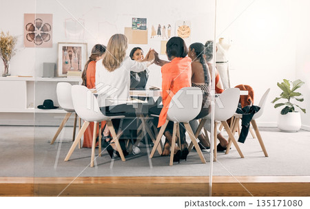 High five, fashion designer and women in business meeting celebration, project success and creative collaboration. Teamwork, clothes startup and group of people, hands together and support in window 135171080