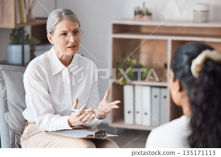 Woman, therapist and consulting patient for counseling, mental health or psychology in healthcare. Female person or psychologist talking to client in anxiety, stress or issues in therapy consultation Woman, therapist and consulting patient for counseling, mental health or psychology in healthcare. Female person or psychologist talking to client in anxiety, stress or issues in therapy consultation 135171113