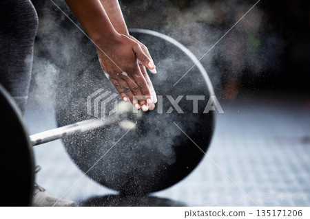 Fitness, barbell or hands of bodybuilder with powder in workout or exercise for strength training. Deadlift, powerlifting closeup or sports athlete weightlifting with chalk or dust on gym floor 135171206