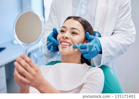 Dentist, mirror and woman check smile after teeth cleaning, braces and dental consultation. Healthcare, dentistry and happy female patient with orthodontist for oral hygiene, wellness and cleaning Dentist, mirror and woman check smile after teeth cleaning, braces and dental consultation. Healthcare, dentistry and happy female patient with orthodontist for oral hygiene, wellness and cleaning 135171401