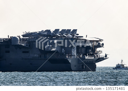 The U.S. Navy nuclear-powered aircraft carrier USS George Washington departs from Yokosuka Naval Base in Kanagawa Prefecture and sails through the Uraga Strait in Tokyo Bay. The U.S. Navy nuclear-powered aircraft carrier USS George Washington departs from Yokosuka Naval Base in Kanagawa Prefecture and sails through the Uraga Strait in Tokyo Bay. 135171481