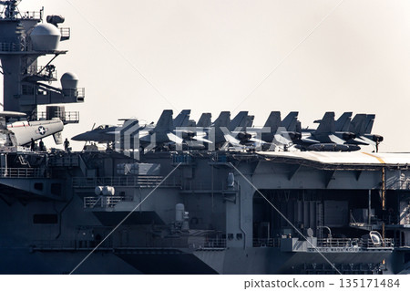 The U.S. Navy nuclear-powered aircraft carrier USS George Washington departs from Yokosuka Naval Base in Kanagawa Prefecture and sails through the Uraga Strait in Tokyo Bay. The U.S. Navy nuclear-powered aircraft carrier USS George Washington departs from Yokosuka Naval Base in Kanagawa Prefecture and sails through the Uraga Strait in Tokyo Bay. 135171484