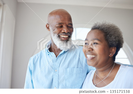 Senior black couple, smile and together in a happy home with love, care and commitment. Face of an african woman and man thinking about marriage, retirement lifestyle and happiness with a hug Senior black couple, smile and together in a happy home with love, care and commitment. Face of an african woman and man thinking about marriage, retirement lifestyle and happiness with a hug 135171538