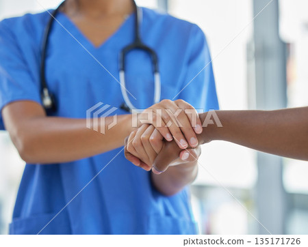 Nurse, holding hands and patient with support, help and grief consulting after cancer news. Hospital, healthcare and clinic worker with person supporting with guidance and advice from health results Nurse, holding hands and patient with support, help and grief consulting after cancer news. Hospital, healthcare and clinic worker with person supporting with guidance and advice from health results 135171726