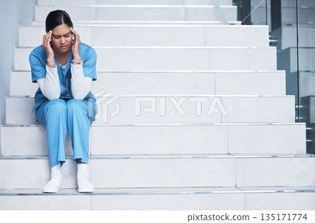Stress, headache and tired with nurse in hospital for burnout, mental health and fatigue. Medical, healthcare and medicine with woman on stairs in clinic for frustrated, anxiety and nursing problem Stress, headache and tired with nurse in hospital for burnout, mental health and fatigue. Medical, healthcare and medicine with woman on stairs in clinic for frustrated, anxiety and nursing problem 135171774